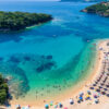 Aerial drone bird’s eye view of of Agia Paraskeui Beach with tur