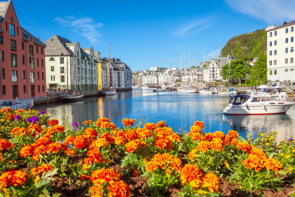 Alesund Sea port with springtime flowers at sunrise, Norway, Scandinavia Alesund Sea port with springtime flowers at sunrise, Norway, Scandinavia